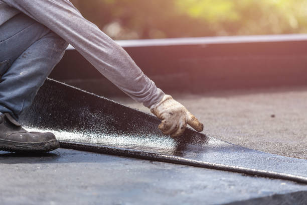 Professional Waterproofing technician working in Tellico Plains, TN